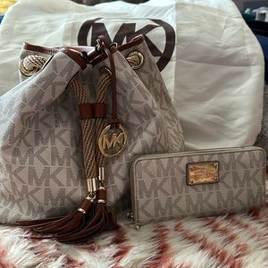 Michael Kors, cream and brown purse and wallet.